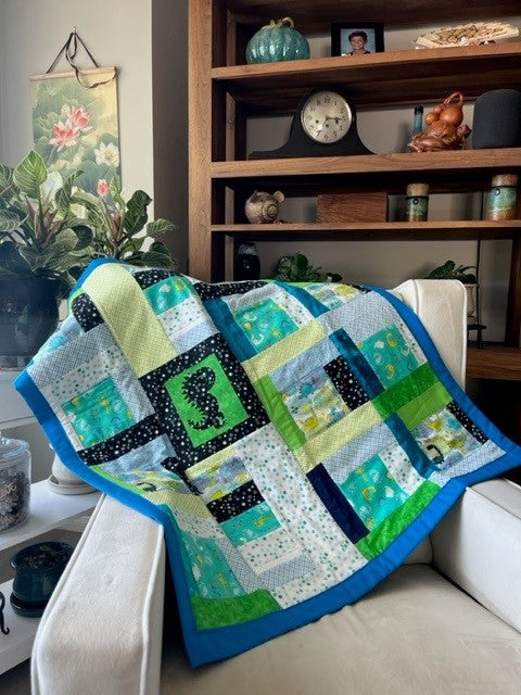 “Dino Delight” Baby Quilt