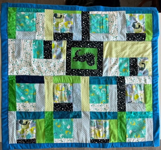 “Dino Delight” Baby Quilt