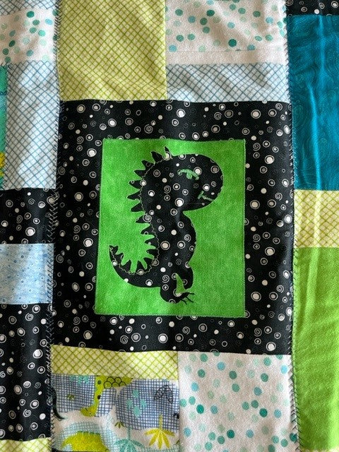 “Dino Delight” Baby Quilt